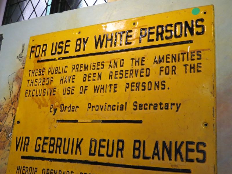 These signs were posted throughout South Africa and restricted life for 