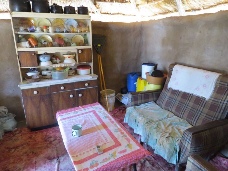 The village chiefs living room- mud walls, thatch roof but cool and comfortable inside