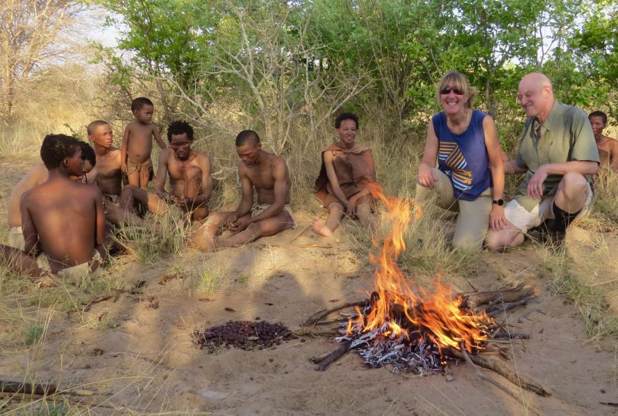 Sitting under a tree in the Bush learning how the bushmen make fire and survive