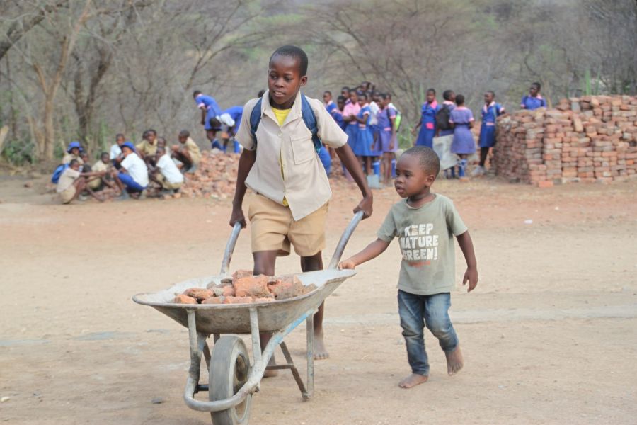 These kids are not afraid to work and even the smallest ones lend a hand